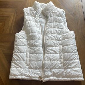 White puffer vest.